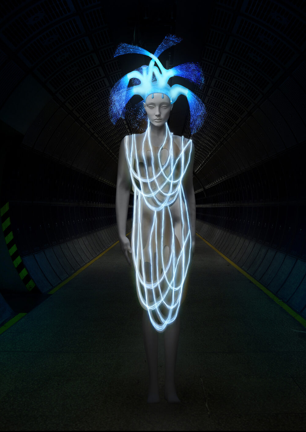 A pale figure wearing a glowing fibre-optic headdress and a dress traced with luminous white lines, standing in a dark tunnel.